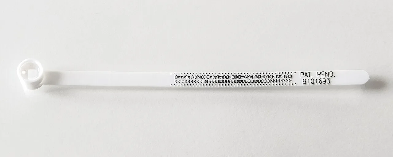 Plastic ring sizer with a scale