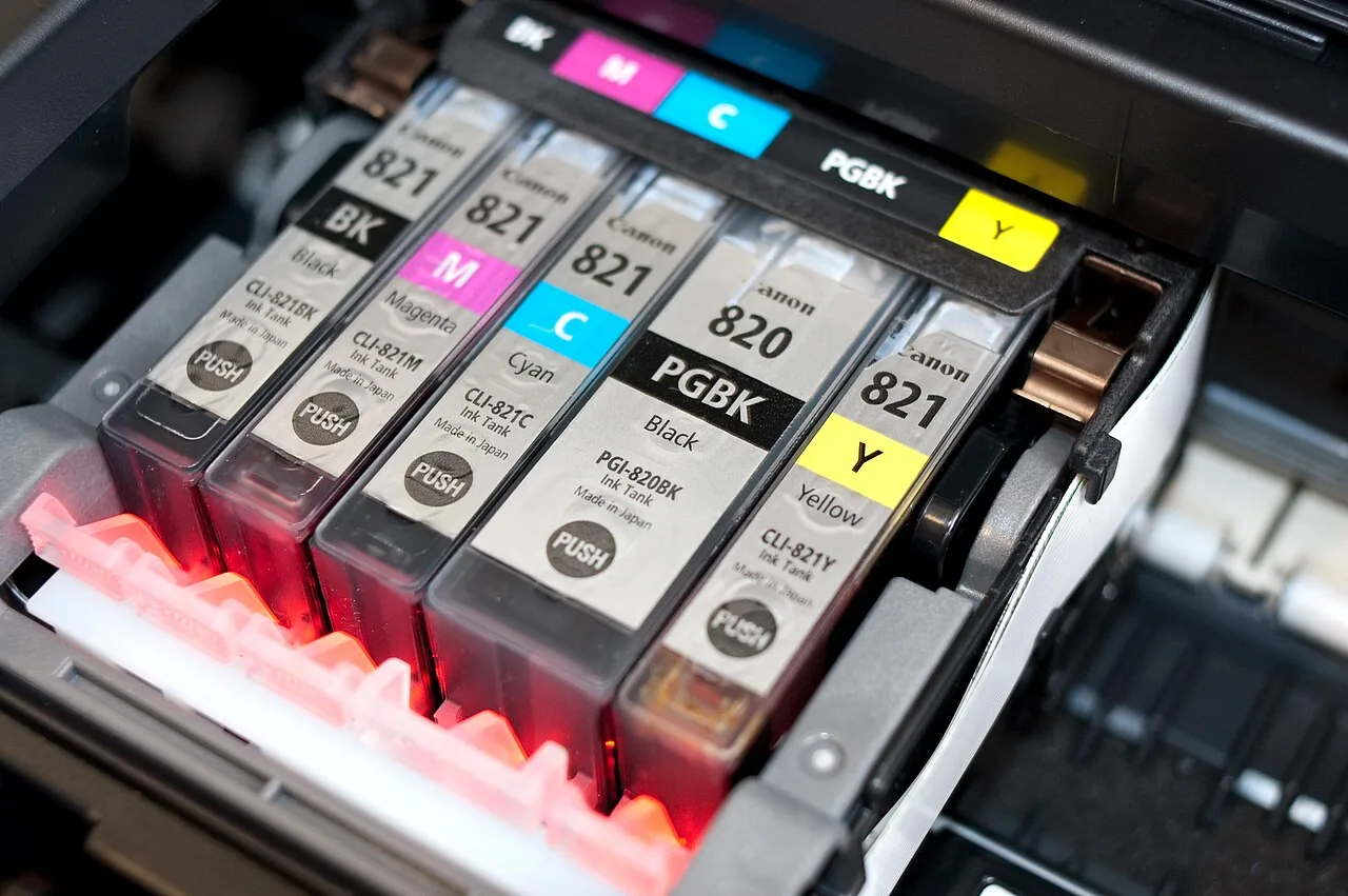 Printer ink cartridges labelled BK, M, C, PGBK and Y
