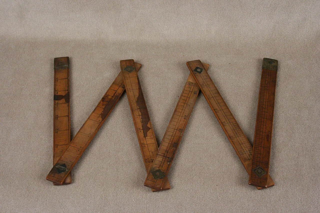 Wooden carpenter’s folding rule with brass joints