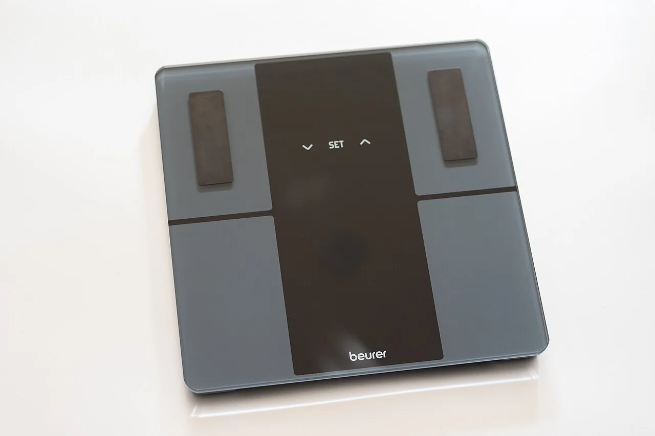 Digital bathroom scale with a glass platform