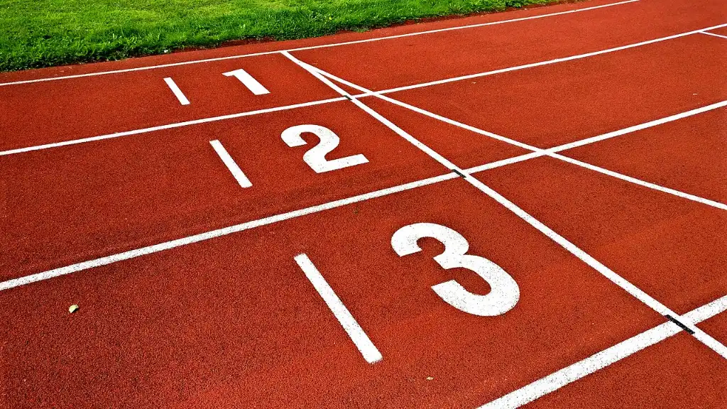 Lane numbers 1, 2 and 3 painted on an athletics track