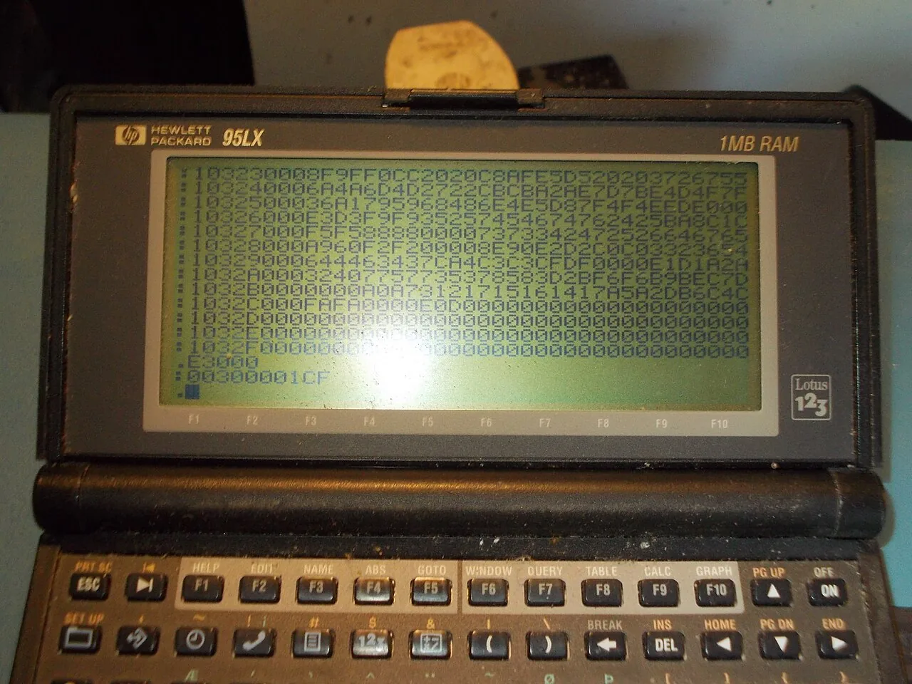 The screen of a palmtop computer listing memory contents in hexadecimal