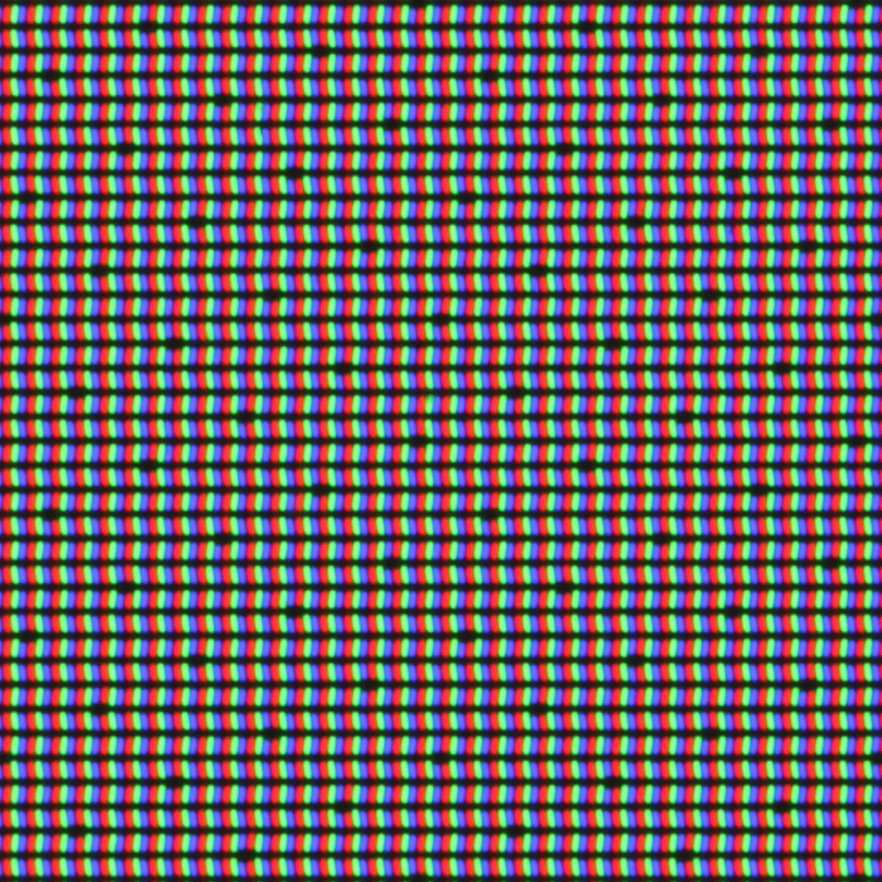 Macro of a phone screen showing the red, green and blue subpixel grid