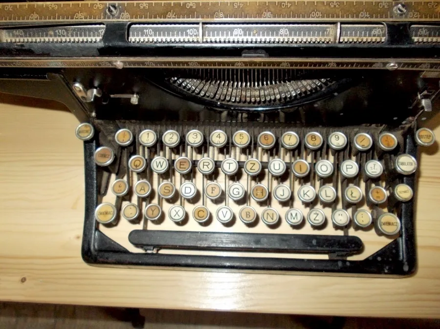 A typewriter keyboard with a character scale along the top